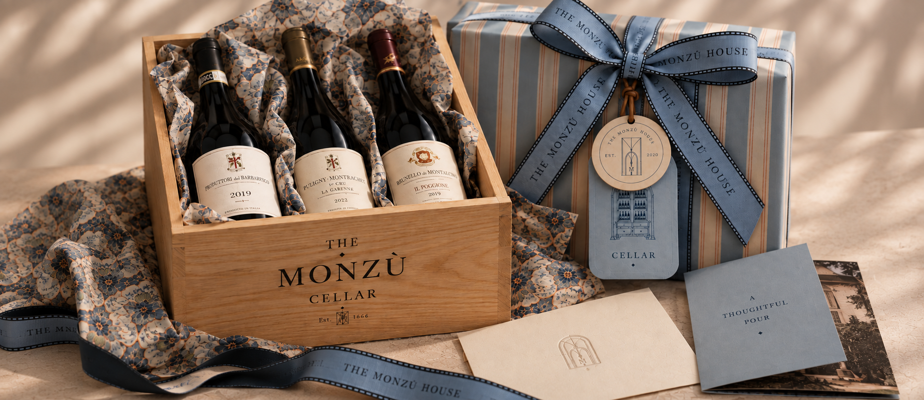 A Monzù Cellar wine bottle presented in a wooden gift box